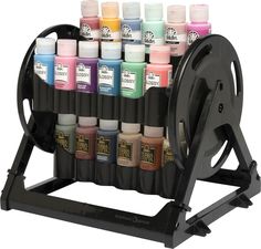 a display with many different colored inks on it's wheels and holder for each color