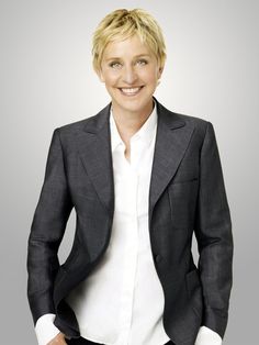 a woman in a black jacket and white shirt