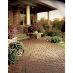 These classic pavers offer timeless beauty to any project. Lowe's 8-in L x 4-in W x 3-in H Rectangle Red/Charcoal Concrete Paver | 605053PIP Laying A Patio, Gravel Pavers, Paver Sand, Stone Entryway, Paver Steps, Gravel Pathway, Patio Stone, Pavers Diy, Lovely Landscapes