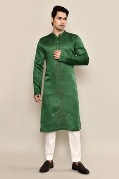 Forest green kurta featuring hand embroidery in the front. Paired with a white pyjama. - Aza Fashions Green Traditional Wear With Naqshi For Eid, Green Naqshi Traditional Wear For Festivals, Green Naqshi Traditional Wear For Eid, Unstitched Green Bandhgala For Navratri, Green Kurta For Traditional Ceremonies, Green Embroidered Sherwani For Navratri, Festive Green Churidar With Naqshi Details, Festive Green Churidar With Naqshi, Long Sleeve Green Sherwani For Navratri