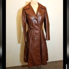 Reposhing This Item I Purchased. Closer To A Size 6 Even Though Items Says Size 14. Retro Long Coat For Fall, Fall Vintage Fashion Single-breasted Outerwear, Retro Formal Fall Outerwear, Retro Belted Outerwear For Fall, Retro Belted Fall Outerwear, Retro Long Sleeve Leather Jacket For Work, Fitted Retro Leather Jacket For Fall, Retro Fitted Leather Jacket For Fall, Fitted Vintage Brown Retro Leather Jacket