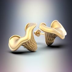 Celebrate the holiday season with a unique Christmas gift for her - Mushroom-inspired earrings crafted in either 14k or 18k solid gold, ideal for everyday wear. These exquisite gold earrings draw inspiration from the beauty of mother nature. Designed to make a statement, these Mushroom earrings are crafted with genuine solid gold, combining polished and raw solid rose gold for a distinct look. Perfect for nature lovers, these earrings showcase craftsmanship and artistry. The dimensions of the earrings are approximately 18mm x 13mm, and they are meticulously designed and created in Italy, adding an extra touch of elegance to this nature-inspired jewelry piece. Each item comes in a high quality presentation pack, inside an elegant black gift box which is perfect to preserve your jewellery wh Unique Yellow Gold Earrings For Gift, Gold Earrings With Mushroom Design For Gift, Unique White Mushroom Design Jewelry, Gift Gold Earrings With Mushroom Design, Whimsical Gold Earrings With Mushroom Design, Gold Mushroom Design Drop Earrings, White Mushroom-shaped Jewelry With Mushroom Design, Muahroom Earrings, Mushroom Jewelry