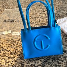 Like New! Telfar Small Shopping Bag Color: Cyan Comes With Original Dust Bag 100% Authentic Telfar Bags, Crossbody Bags, Dust Bag, Color Blue, Bag Lady, Like New, The Originals, Women Shopping, Blue