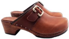 Leather Slip-on Clogs With Buckle Closure, Brown Leather Mules With Buckle Closure, Leather Mules With Tang Buckle And Round Toe, Classic Brown Clogs With Buckle Closure, Brown Leather Clogs With Buckle Closure, Brown Leather Footbed Clogs With Open Heel, Classic Slip-on Clogs With Buckle, Classic Clogs With Buckle Closure And Round Toe, Brown Leather Clogs With Heel Loop