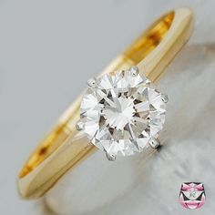 an engagement ring with a diamond in the center