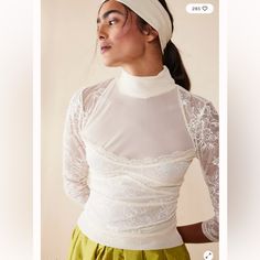 Delicate And Dainty, This Turtleneck From Intimately Features A Lacy Bodice And ¾ Length Sleeves, Complete With A Flattering Back Cut Out For A Special Touch. Fit: Formfitting Features: Turtle Neckline, Lace ¾ Sleeves, Lace Bodice, Mesh Inlay, Open Back Cut Out Why We <3 It: This Stunning Top Can Truly Be Worn In Any Season. Intimately Our Softest Intimates And Best-Ever Base Layers. Intimately Is An In-House Label. Care/Import Machine Wash Cold Import Contents 90% Nylon, 10% Spandex Measurement Elegant White Stretch Mesh Top, Feminine Fitted Lace Top For Brunch, Fitted Feminine Lace Top For Brunch, White Stretch Lace Top For Layering, Fitted White Lace Top For Layering, Elegant White Fitted Mesh Top, Elegant Fitted Lace Top For Brunch, Fitted Lace Top For Brunch, Elegant White Lace Top For Layering