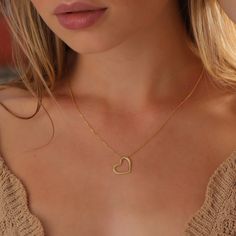 Dainty and timeless jewelry pieces that are made to elevate those everyday moments and bring you into your feminine power. Dainty Heart Outline Necklace is the perfect gift for Life's special moments, such as Christmas, Valentine's Day and Mother's Day. ♡ DAINTY∙ HEART∙ NECKLACE ◇  ◇ Made to Order ◇ Dimensions: 17 mm x 15 mm  ◇ Material Options: High Quality 925 Silver and 14K Solid Gold ◇ Color Options: Gold ∙ Rose Gold ∙ White Gold ◇ All our jewelry is handmade with passion and care in our wor Delicate Everyday Necklaces With Heart Beads, Delicate Heart Beads Necklaces For Everyday, Delicate Heart Beads Necklace For Everyday, Personalized Heart Necklace For Everyday Wear, Adjustable Chain Charm Necklace For Valentine's Day, Everyday Heart Beads Open Heart Necklace, Everyday Adjustable Charm Necklace For Valentine's Day, Simple Necklace With Heart Charm As A Gift, Everyday Jewelry With Heart Pendant Clavicle Chain