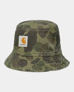 Color: Green / Office Green (garment dyed) - The Duck Bucket Hat is an unlined, unstructured style made from Dearborn Canvas and features an allover camouflage print. The item has also been garment-dyed for a softer feel and complex color configuration. A woven Square Label completes the design. _* S/M: 56 cm - 22.0 inch, M/L: 59 cm - 23.2 inch, L/XL: 61 cm - 24.0 inch, 100% Cotton (organic, Dearborn Canvas), Allover print, Square Label Duck Bucket Hat, Camo Bucket Hat, Office Green, Green Office, Baby Tank, Camouflage Print, The Duck, Nudie Jeans, Kids Pants