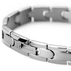 * Tough titanium construction 
 * Striking silver-tone matte finish Modern Durable Silver Bracelets, Modern Silver Tungsten Carbide Jewelry, Modern Silver Magnetic Bracelets, Modern Silver Magnetic Bracelet, Modern Stainless Steel Chain Bracelet, Modern Stainless Steel Durable Chain Bracelet, Mind Puzzles, Lock Bracelet, S Bracelet