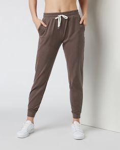 Meet the pants you’ll never want to take off, now in a longer inseam. The Performance Joggers have a slim but relaxed fit with a slightly cropped leg, side pockets and a drawstring. Designed with our softest premium DreamKnit™ stretch fabric, they’re your new go-to. | Vuori Performance Jogger Pants - Long | Fossil Heather | Large Vuori makes premium performance apparel inspired by the active Coastal California lifestyle; an integration of fitness, surf, sport, and art. Breaking down the boundari Cozy Pants, Coastal California, Soft Joggers, California Lifestyle, Pants Details, Cargo Joggers, Ski Pants, Performance Outfit, Sport Pants