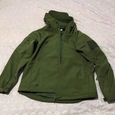 Men's Hooded Jacket | Fashionable Style Coat | Outdoor Outfit Apparel Khaki Windproof Long Sleeve Parka, Hooded Khaki Techwear Outerwear, Khaki Hooded Outerwear With Fleece Lining, Khaki Long Sleeve Windproof Parka, Green Techwear Outerwear With Detachable Hood, Functional Green Outerwear For Fall, Green Functional Outerwear For Fall, Green Functional Fall Outerwear, Khaki Windproof Long Sleeve Hooded Jacket