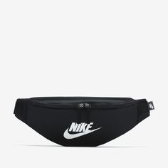 A comfortable and easy to adjust strap makes the Nike Heritage Waistpack a no brainer for everyday trips. The main compartment provides secure storage for your phone, snacks or wallet while the smaller accessories pocket on the backside helps keep things like your keys, travel info safe and close at hand. This product is made with at least 65% recycled polyester. Nike Belt Bag, Nike Bags, Waist Pack, Nike Sb, Boys Shoes, Fanny Pack, Casual Sneakers, Belt Bag, Black Nikes