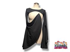 This shrug is the ultimate in comfort, perfect for layering and adding dramatic flair to any ensemble! Made of spandex fabric, so perfect for those chilled festival evenings. Made to Order Summer Party Shrug With Stretch, Stretch Summer Party Shrug, Fitted Black Shrug For Night Out, Stretch Long Sleeve Shrug For Night Out, Black Stretch Shrug For Spring, Stretch Tops For Summer Cosplay, Fitted Black Summer Shrug, Summer Stretch Tops For Cosplay, Fitted Black Shrug For Summer