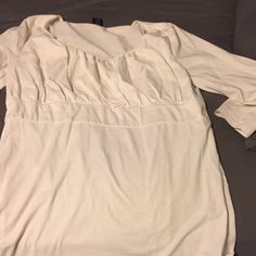 Women's White 3/4 Shirt. Worn And Washed; Not A Brand New White Color. Size Large. Fitted Beige Half Sleeve Tops, Fitted Cotton Tops With 3/4 Sleeves, White Fitted Top With 3/4 Sleeves, White Half Sleeve Top For Daywear, White Stretch Top With 3/4 Sleeve, White Relaxed Fit Top With 3/4 Sleeves, White Relaxed Fit Shirt With 3/4 Sleeves, White Fitted Shirt With 3/4 Sleeves, Stretch Cotton Tops With 3/4 Sleeves