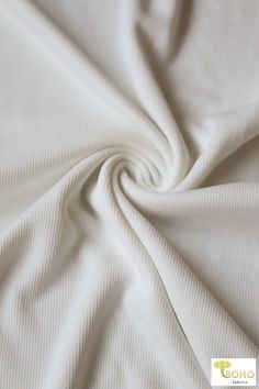 The subtle elegance of our Ivory Cupro Rib Knit Fabric makes it ideal for sophisticated wardrobe essentials. Horizontal Stretch: 75% Vertical Stretch: 25% Weight: 8 oz Width of Fabric: 61" Contents: Poly/Rayon Knit Fabric Swatch, Boho Fabrics, Pattern Weights, Rib Knit Fabric, Boho Fabric, Rib Fabric, Fabric Swatch, Fabric Sale, Stretch Velvet