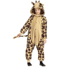 a young boy in a giraffe costume