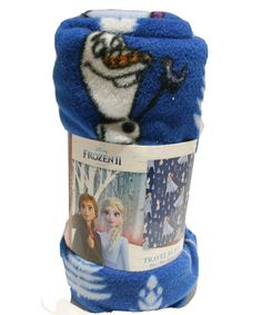 a blue and white blanket with an image of disney frozen 2 on the front, and two