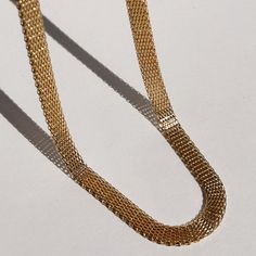 The Euro Mesh Necklace is the perfect stacking necklace for all travelers. Made of lightweight & durable 14k Gold-Filled metal, it is made to be worn every day. It encompasses a simple & sleek design that is versatile for any occasion. Add The Euro Mesh Necklace to your collection today. Product Details: 6mm 14k Gold-Filled Mesh Chain 16" & 18" Lengths Available Water-Wearable Made in Scottsdale, AZ Click Here to Buy an Extender Model Specs: Model is wearing 16" The Euro in both on-body shots Adjustable Box Chain Necklace For Everyday, Gold Herringbone Necklace With Box Chain For Everyday, Gold Herringbone Necklace With Box Chain, Modern Gold Herringbone Necklace For Everyday Wear, Gold Modern Herringbone Necklace For Everyday, Everyday Gold Chain Jewelry, Modern Gold Herringbone Necklace For Everyday, Classic Yellow Gold Jewelry For Everyday Use, Classic Yellow Gold Jewelry For Everyday