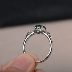 This is a gorgeous handmade creation, a combination of beauty, simplicity & Elegance. The 7*7mm round cut lab emerald is crafted in solid sterling silver and with rhodium plated. 14K white gold/rose gold/yellow gold available as well,pls contact me if you need. All item is sent in a beautiful gift box You can realize more lovely stuff clicking the link https://www.etsy.com/shop/knightjewelry?refshopsection_shophome_leftnav Please leave the correct address and you phone number for delivering Wedding Emerald Ring In 14k White Gold, Emerald Bezel Setting Ring For Wedding, Elegant Bezel-set Emerald Ring For May Birthstone, Elegant Emerald Ring With Bezel Setting, Timeless Emerald Ring With Accent Stones For Promise, Exquisite Emerald Promise Ring, Timeless Round Emerald Promise Ring, Dainty Solitaire Emerald Cut Emerald Ring, Sterling Silver Emerald Ring With Accent Stones