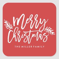 merry christmas the miller family sticker on a red square background with white lettering and evergreen leaves