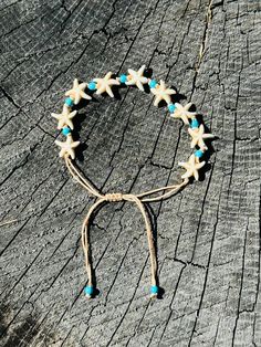 Embrace the beauty of the ocean with this handmade delicate starfish charm bracelet!  This charming bracelet showcases a delicate starfish charm, meticulously crafted. The design adds a touch of coastal elegance to any outfit, making it perfect for everyday wear or a reminder of the ocean's serenity. Here's what makes this bracelet special: *Handmade with Love: Each bracelet is lovingly handcrafted, ensuring a unique and delicate piece you'll treasure. *Starfish Charm: The starfish charm adds a Bohemian Adjustable Bracelet With Star Charm, Beach Jewelry With Adjustable Star Charm, Beach Adjustable Jewelry With Star Charm, Adjustable Beach Jewelry With Star Charm, Adjustable Star Charm Jewelry For Beach, Vacation Bracelet With Starfish Charm, Handmade White Starfish Bracelets, Bohemian Style Bracelet With Starfish Charm, Adjustable Ocean-inspired Bracelets