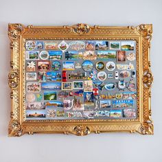 a gold frame with many pictures on it