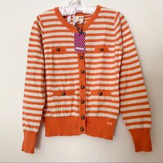 Cute Tommygirl Cardigan Striped Orange And White. Has Buttons Along The Front And Pockets. Spring Preppy Cotton Sweater, Casual Orange Cotton Cardigan, Cute Cotton Cardigan With Button Closure, Cotton Cardigan With Button Closure, Cute Style, Playful Cotton Cardigan For Spring, Tommy Hilfiger Long Sleeve Sweater For Spring, Preppy Long Sleeve Cotton Cardigan, Preppy Cotton Cardigan With Long Sleeves, Cute Cotton Sweater With Buttons