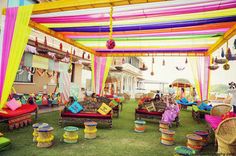 an outdoor seating area decorated in bright colors