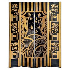 a black and gold room divider with flowers on the top, two panels are open