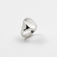 MEREWIF : Shop All : ELIOT SIGNET - SILVER Everyday Timeless Sterling Silver Engraved Ring, Everyday Sterling Silver Signet Ring, Minimalist Open Signet Ring With Engraving Option, Everyday Polished Signet Ring, Everyday Polished Finish Signet Ring, Minimalist Signet Ring With Polished Edges, Minimalist Polished Signet Ring, Silver Signet Ring With Polished Finish, Oval Sterling Silver Rings With Polished Edges