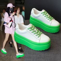 A perfect blend of style and comfort these platform wedges for women are designed for spring and autumn wear using genuine leather upper material and a latex insole. The green and white shoes have a super high thick sole and a mixed colors fashion element. They are solid patterned sneakers with a lace-up closure. Autumn Wear, Shoes Green, Genuine Leather Shoes, Wedge Sneakers, Chunky Sneakers, Mixed Colors, Platform Wedge, Spring And Autumn, Sneakers Shoes