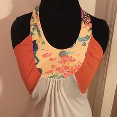 New But Never Worn,Hooks In Back At Neck,Unique Details Under Arm,Logo Stitched Near Hem,95% Modal,5% Spandex,Size Small But Runs A Lil Large Bin (D-31) Patchwork Tank Top For Beach In Spring, Fitted Color Block Tops For Beach, Fitted Color Block Beach Tops, Casual Patchwork Tank Top For Beach, Fun Orange Top For Spring, Sleeveless Color Block Tops For Vacation, Orange Stretch Summer Tops, Summer Beach Tank Top With Patchwork, Summer Orange Patchwork Tops