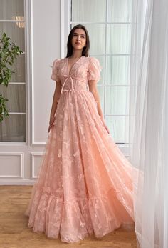 Rosette Papillon Gown | Teuta Matoshi Dresses With Butterflies, Floral Print Prom Dress, Sunday Dresses, Princess Evening Dress, Teuta Matoshi, Feather Prom Dress, Tiered Prom Dress, Printed Prom Dresses, Long Party Dress