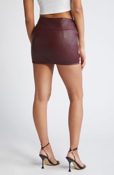 Head off to the racetrack in this chic colorblocked miniskirt made from paneled faux leather. 55% viscose, 45% polyurethane with 97% polyester, 3% elastane contrast Dry clean Imported Leather Mini Bottoms For Fall, Fitted Brown Faux Leather Mini Skirt, Chic Leather Mini Bottoms, Brown Faux Leather Mini Skirt For Party, Party Faux Leather Brown Mini Skirt, Spring Leather Mini Bottoms, Brown Faux Leather Mini Skirt, Chic Mini Faux Leather Skort, Chic Mini Length Faux Leather Skort