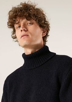 This refined turtleneck is made of wool, 100% made in Italy, which makes it soft and ideal for every look, modern and timeless.   Alpaca wool Turtleneck Very soft Made in Italy Composition: 68% WP 22% PA 10% WO Code: aamintore-r8900-21 Casual Wool Turtleneck For Work, Formal Merino Wool Sweater For Winter, Formal Wool Sweater With Ribbed Collar, High Neck Wool Sweater For Work, Elegant Blue Wool Sweater, Luxury Winter Sweater For Workwear, High Neck Cashmere Sweater For Work, Elegant Business Sweater For Winter, Elegant Winter Business Sweater