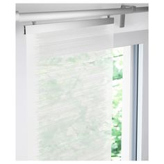 an open window with white blinds on it