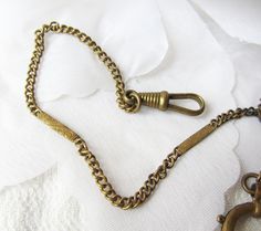 Amazing vintage  pocket watch chain in gold color. Unique and very beautiful design. Can be used as a watch chain or choker. In very good vintage condition. All pictures are real you get exactly the subject from the photos and everything I suggest is authentic without imitations.Enjoy :) 19" or 49cm. long Look more unique vintage and antique item in my store: http://www.etsy.com/shop/TedDiscovery?ref=si_shop For any questions do not hesitate to contact me. It will be send with Priority mail and Watch Pocket, Antique Watch, Watch Holder, Vintage Pocket Watch, Pocket Watch Chain, Antique Watches, Pocket Watches, Watch Chain, Chain Gold