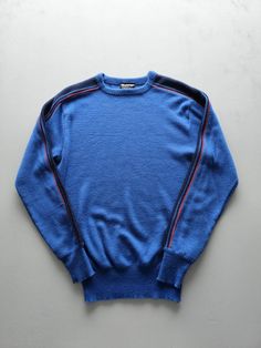 Listing: Vintage 1970s Meister Blue Acrylic Tight Knit Crewneck Sweater M Size on Tag: M Flaws: Fabric pilling Measurements: Please see the photos in the listing. If you require additional measurements or information about this item, feel free to send a message. Fitted Blue Sweater With Ribbed Cuffs, Fitted Blue Tops With Ribbed Cuffs, Blue Fitted Wool Sweater, Fitted Blue Wool Sweater, Retro Knit Tops With Ribbed Cuffs, Blue Wool Long Sleeve Tops, Blue Wool Tops With Ribbed Cuffs, Retro Blue Long Sleeve Sweater, Blue Long Sleeve Retro Sweater