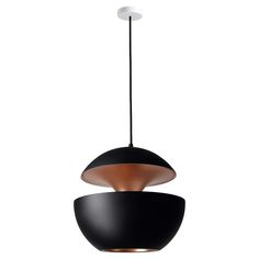 a black and gold pendant light hanging from a ceiling