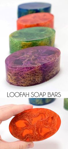 four different colored soap bars with the words loofah soap bars written on them