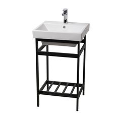 a white sink sitting on top of a black stand