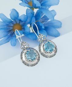 "These stylish earrings are the perfect gift for yourself or a loved one. The sky blue topaz or rose quartz gemstone is oxidized and highly polished, while the filigree design creates a sophisticated look that will go with any outfit. This is exactly what you need to add a pop of color to your everyday style! Let your style shine with our new drop earrings. This sterling silver earring set is made of filigree art flower details and adorned with sky blue topaz or rose quartz gemstone. The earring Light Blue Gemstone Earrings - Fine Jewelry, Light Blue Gemstone Earrings For Anniversary, Blue Round Topaz Earrings, Fine Jewelry Blue Topaz Round Earrings, Blue Topaz Round Earrings, Blue Topaz Birthstone Round Earrings, Blue Topaz Blue Earrings, Light Blue Topaz Gemstone Earrings, Blue Topaz Birthstone Earrings