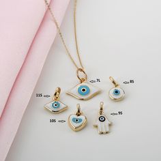 Handmade Solid 14k Gold Enamel Charms are Absolutely stunning. You can buy them either as a charm or you can purchase chain for it by simply clicking on the listing URLs at below. Chains are sold seperately ⛓ Cable Chain https://etsy.me/2IoJFoV ⛓ Paper Clip Chain https://etsy.me/39OJ631 ⛓ Ball Chain https://etsy.me/36SGoaF ✔ Charm Diameters are approximetly 1/2 inch ( 1.25cm - 1.5cm ) Bails are 6mm. Larger ones are 8mm ( has L after number ) Available 14K Solid Yellow Gold Worldwide DHL shipping Evil Eye Enamel Jewelry As A Gift, Evil Eye Enamel Jewelry Gift, Yellow Gold Enamel Charms For Gift, White Spiritual Jewelry With Heart Charm, White Charm Necklaces For Good Luck, White Good Luck Charm Necklaces, White Enamel Pendant Charm Necklaces, White Enamel Charm Necklaces, White Pendant Charms For Gift