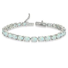 PRICES MAY VARY. Feature - Express your style and elegance with this classic tennis bracelet. This stunning bracelet features dazzling 6x4mm oval-cut gemstones, for a chic and trendy look Crafted - The bracelet is crafted of fine sterling silver. It measures 7.25 inches and secures with a box and tongue with a safety latch Care - Keep from water cosmetics & chemical product. Clean with microfiber cloth Packaging - Jewelry packaged with a nice box ready for gifting About – Our jewelry collection Opal Bangle, Bridesmaid Bracelet Gift, Small Bracelets, Bracelet Display, Birthstone Bracelet, Opal Bracelet, Birthstone Bracelets, Bride Jewellery, Bracelet For Women