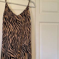 Tiger Print Tags Still Attached Taking Best Offer! Size Medium But Fits Like A Small Tiger Stripe Dress, Chic Tiger Print Mini Dress For Spring, Chic Tiger Print Summer Dress, Chic Summer Tiger Print Dress, Spring Tiger Print Dress For Night Out, Chic Summer Dress With Tiger Print, Summer Tiger Print Dress For Date Night, Sleeveless Tiger Print Mini Dress For Summer, Spring Tiger Print Sleeveless Dresses