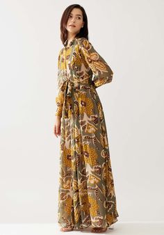 Embrace effortless elegance with this olive and mustard floral long dress, featuring a captivating floral pattern that beautifully complements the rich hues. The flowing silhouette and lightweight fabric make it perfect for any occasion, from garden parties to evening events, ensuring you radiate sophistication and charm. Floral Long Dress, Floral Dresses Long, Garden Parties, Effortless Elegance, Xl Dress, Dresses Xs, Garden Party, Artistic Designs, Lightweight Fabric