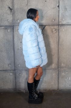 ·Blue faux fur coat·Perwinkle lining·Mid length·Includes hood, pockets, and front zipper closure Hooded Faux Fur Parka With Fur Trim, Hooded Faux Fur Coat With Fluffy Detail, Hooded Fluffy Faux Fur Coat, Fluffy Hooded Faux Fur Outerwear, Fluffy Hooded Faux Fur Coat, Hooded Faux Fur Coat With Pockets, Fall Faux Fur Coat With Detachable Hood, Fluffy Hooded Fur Coat For Cold Weather, Winter Faux Fur Coat With Zipper Closure