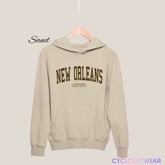 Vintage Style New Orleans Louisiana  Unisex Hoodie Perfect for any situation, these heavy blend hooded sweatshirts are pure comfort. Made from a polyester and cotton combination which helps designs come out looking fresh and beautiful. The collar is ribbed knit, so it retains its shape even after washing. There are no itchy side seams on these sweaters. SIZING: Sweatshirts are unisex regular fit. Pick your usual size for a normal fit or size up for a more relaxed feel. Please check size chart fo Fan Souvenir, Vacation Usa, College Sweatshirt, Style Sweatshirt, New Orleans Louisiana, New Orleans Saints, Diy Style, Sports Fan, Cool Fabric