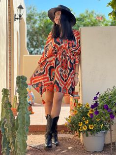 Say hello to our Italian silk crepe Angelo Tangelo ikat pattern!Fresh off the printing press so to speak, this dress is certain to get you noticed! The colors are vibrant, joyful, and full of PAX passion. Length 32" one size, drawstring waist fits all. Dry Clean. Made in India 100% Italian silk crepe. Orange Rayon Beach Dress, Multicolor Batik Print Summer Dress, Bohemian Abstract Print Dress For Vacation, Beach Dresses With Bold Patterned Print, Beach Dresses With Abstract Print, Flowy Abstract Print Beach Dress, Beach Dresses With Bold Multicolor Print, Bohemian Multicolor Rayon Kaftan, Bohemian Beach Dress With Abstract Print