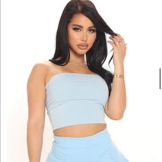 Baby Blue Stretchy Cropped Tube Top From Fashion Nova Size Large Never Worn. Chic Blue Tube Top For Spring, Blue Tube Top For Day Out, Blue Sleeveless Tube Top For Day Out, Blue Tube Top For Spring Day Out, Blue Tube Top For Day Out In Spring, Light Blue Casual Tube Top For Spring, Sleeveless Blue Tube Top For Day Out, Casual Blue Tube Top For Party, Light Blue Stretch Tube Top For Summer